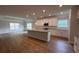 Kitchen featuring a central island, modern appliances, and open layout at 5311 Tuscany Dr, Douglasville, GA 30135