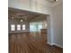 Open-concept living room with hardwood floors and abundant natural light at 5311 Tuscany Dr, Douglasville, GA 30135
