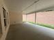 Covered patio featuring a concrete floor and view of the backyard at 5311 Tuscany Dr, Douglasville, GA 30135