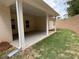 A spacious covered patio with a view of the landscaped backyard at 5311 Tuscany Dr, Douglasville, GA 30135