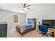 Relaxing bedroom with desk and chair, ceiling fan and natural light at 125 Atkins Ln, Fayetteville, GA 30215