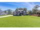 Beautiful two-story home with a well-manicured lawn at 125 Atkins Ln, Fayetteville, GA 30215