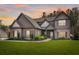 Charming home with mixed materials, well-kept lawn, and twilight skies at 125 Atkins Ln, Fayetteville, GA 30215