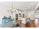 Bright eat-in kitchen features granite counters, stainless appliances, and an island with seating at 125 Atkins Ln, Fayetteville, GA 30215
