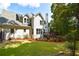 Charming two-story home with a well-maintained lawn and inviting back deck at 1858 De Winton Pl, Lawrenceville, GA 30043