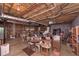 Large unfinished basement area with visible ceiling fixtures and concrete walls, ideal for storage or customization at 3743 Johnston Rd, Winston, GA 30187
