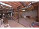 Spacious unfinished basement with exposed ceiling, offering possibilities for customization and storage at 3743 Johnston Rd, Winston, GA 30187