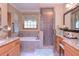 Bathroom with a separate shower, bathtub and tiled floors at 3743 Johnston Rd, Winston, GA 30187