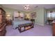 Bedroom with a ceiling fan and comfortable sleeping arrangements at 3743 Johnston Rd, Winston, GA 30187