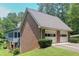 Spacious two-car garage exterior with brick facade at 3743 Johnston Rd, Winston, GA 30187