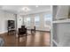 Bright flex room with hardwood floors and views of the neighborhood at 89 Batten Board Way, Woodstock, GA 30189
