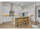 Modern kitchen with stainless steel appliances, center island, and sleek cabinetry at 89 Batten Board Way, Woodstock, GA 30189