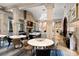 Elegant club lounge with stylish furnishings and stone fireplace at 89 Batten Board Way, Woodstock, GA 30189