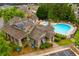 Resort style pool surrounded by mature landscaping and lounge seating at 89 Batten Board Way, Woodstock, GA 30189