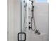 Contemporary shower with dual shower heads, niche and marble tile at 89 Batten Board Way, Woodstock, GA 30189