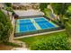 Aerial view of tennis and pickle ball courts, surrounded by manicured landscaping at 89 Batten Board Way, Woodstock, GA 30189
