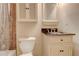 Traditional bathroom features a shower, toilet, vanity, and storage cabinet at 1160 Newpark View Pl # 8, Mableton, GA 30126