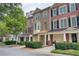 Charming brick townhomes with attached garages and covered front porches at 1160 Newpark View Pl # 8, Mableton, GA 30126