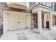 Spacious two car garage with attached pillars and front door at 1160 Newpark View Pl # 8, Mableton, GA 30126