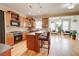 Open kitchen with a center island, stainless steel appliances, and hardwood floors at 1160 Newpark View Pl # 8, Mableton, GA 30126