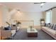 Living room with plush seating, soft lighting, and a staircase to the second floor at 1160 Newpark View Pl # 8, Mableton, GA 30126