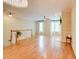 Spacious living room featuring hardwood floors, a fireplace, and large windows at 1160 Newpark View Pl # 8, Mableton, GA 30126