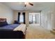 Spacious main bedroom with neutral carpet and a seating area at 1160 Newpark View Pl # 8, Mableton, GA 30126