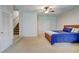 Spacious main bedroom with neutral carpet and ceiling fan at 1160 Newpark View Pl # 8, Mableton, GA 30126