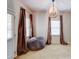 Cozy seating area with large windows and modern light fixture at 1160 Newpark View Pl # 8, Mableton, GA 30126