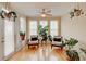 Sunroom with bright windows, wood floors, and indoor plants at 1160 Newpark View Pl # 8, Mableton, GA 30126