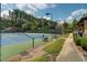 Well-maintained tennis courts with lush green surroundings provide residents a place for outdoor recreation at 1160 Newpark View Pl # 8, Mableton, GA 30126