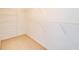 Empty walk-in closet with wire shelves and neutral carpet at 1160 Newpark View Pl # 8, Mableton, GA 30126