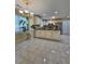 Bright kitchen with tile floors, white cabinets, and stainless steel appliances at 2209 Willow Crest Cir, Lawrenceville, GA 30044