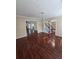Elegant living room with gleaming hardwood floors and classic chandelier at 2209 Willow Crest Cir, Lawrenceville, GA 30044