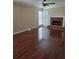 Inviting living room features hardwood floors, fireplace, and lots of natural light at 2209 Willow Crest Cir, Lawrenceville, GA 30044