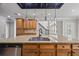 Spacious kitchen island with granite counters, stainless steel dishwasher, and custom cabinets at 3843 Dragon Fly Ln, Loganville, GA 30052