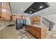 Spacious kitchen features granite counters, wooden cabinets, stainless steel appliances, and a large kitchen island at 3843 Dragon Fly Ln, Loganville, GA 30052