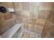 Tiled shower enclosure with bench, shower head and soap holder at 3843 Dragon Fly Ln, Loganville, GA 30052