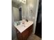 Bathroom features a vanity with a sink and ample lighting at 4018 Carisbrook Dr, Union City, GA 30291