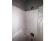 Shower and bath of a bathroom feature a sleek design and modern fixtures at 4018 Carisbrook Dr, Union City, GA 30291