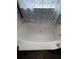 Clean bathtub with a shower curtain, ready for relaxation in a bright and functional bathroom at 4018 Carisbrook Dr, Union City, GA 30291