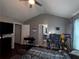 Large bedroom with multiple doors, ceiling fan, neutral walls, and ample floor space at 4018 Carisbrook Dr, Union City, GA 30291