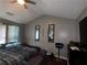 Spacious bedroom with ceiling fan, natural light, and neutral paint at 4018 Carisbrook Dr, Union City, GA 30291