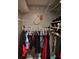 Well-organized closet with hanging clothes, shelves, and functional storage solutions at 4018 Carisbrook Dr, Union City, GA 30291