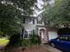 Charming two-story home with a well-manicured lawn and a private driveway at 4018 Carisbrook Dr, Union City, GA 30291