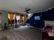 Comfortable living room boasts hardwood floors and ample natural light at 4018 Carisbrook Dr, Union City, GA 30291