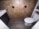 Compact powder room with modern fixtures, ceramic tile, and convenient layout at 4018 Carisbrook Dr, Union City, GA 30291