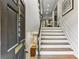 Inviting entryway features hardwood stairs, white risers and trim, and decorative accents at 2466 Brookhaven Ne Pl, Brookhaven, GA 30319