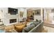 Cozy living room with a fireplace, built-in shelving, and comfortable seating at 2466 Brookhaven Ne Pl, Brookhaven, GA 30319
