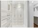 Walk-in closet featuring custom drawers and built-in shelving at 2466 Brookhaven Ne Pl, Brookhaven, GA 30319